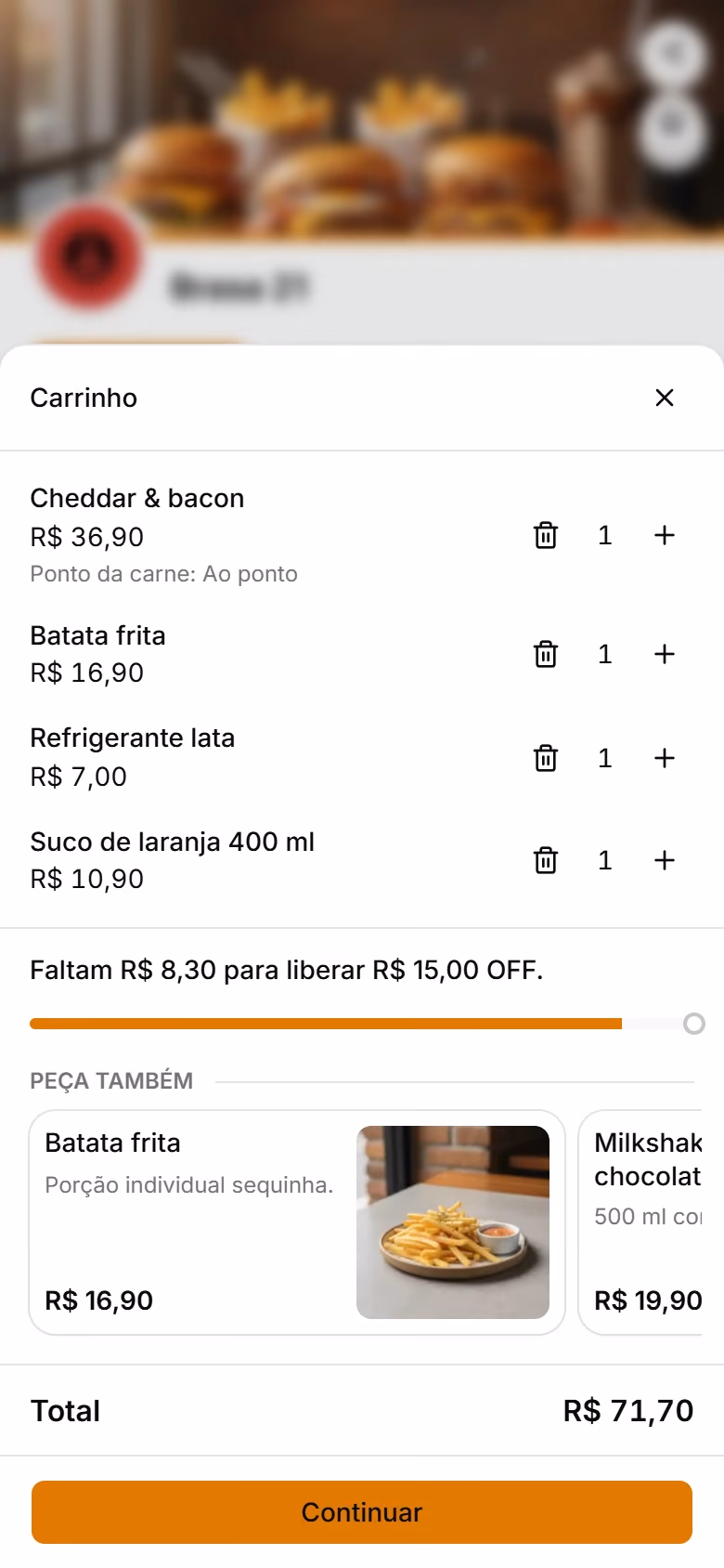 Carrinho de uma hamburgueria mostrando quanto falta para liberar um cupom de desconto.